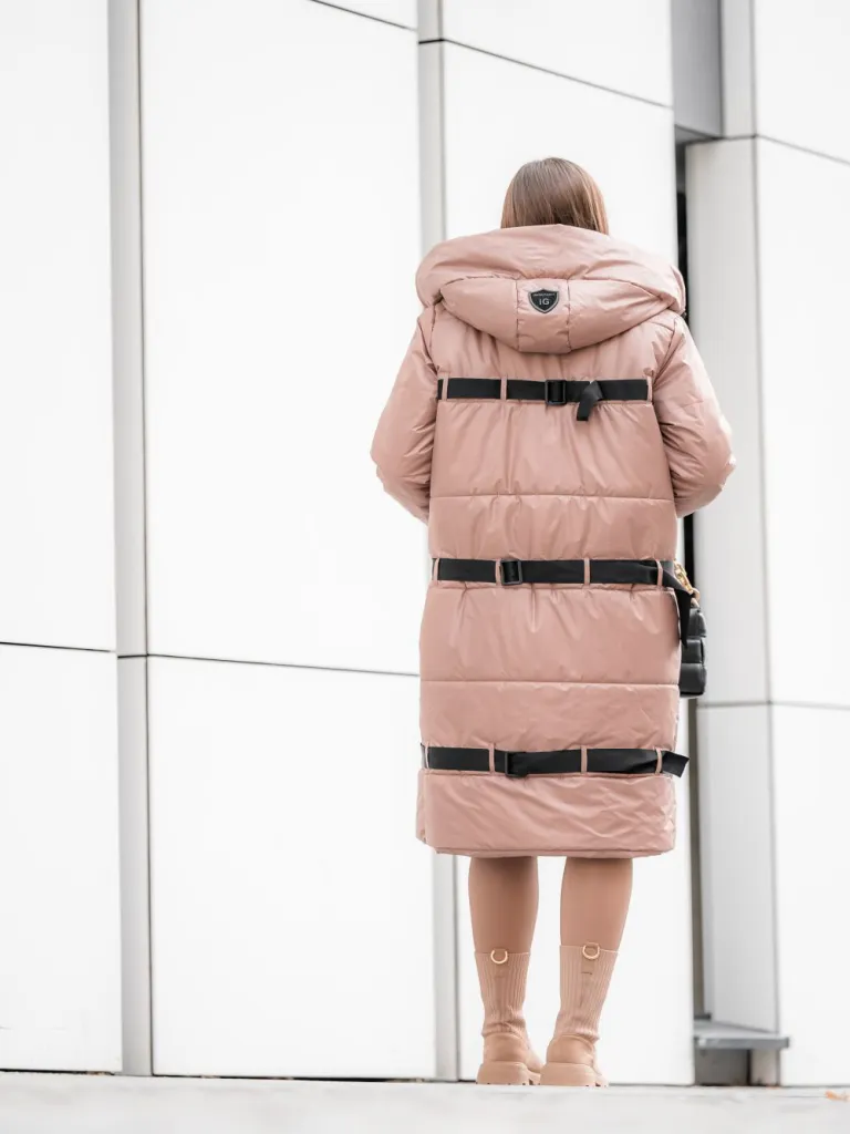 Beautiful women's coat with ribbons, zipper fastening and a hood.