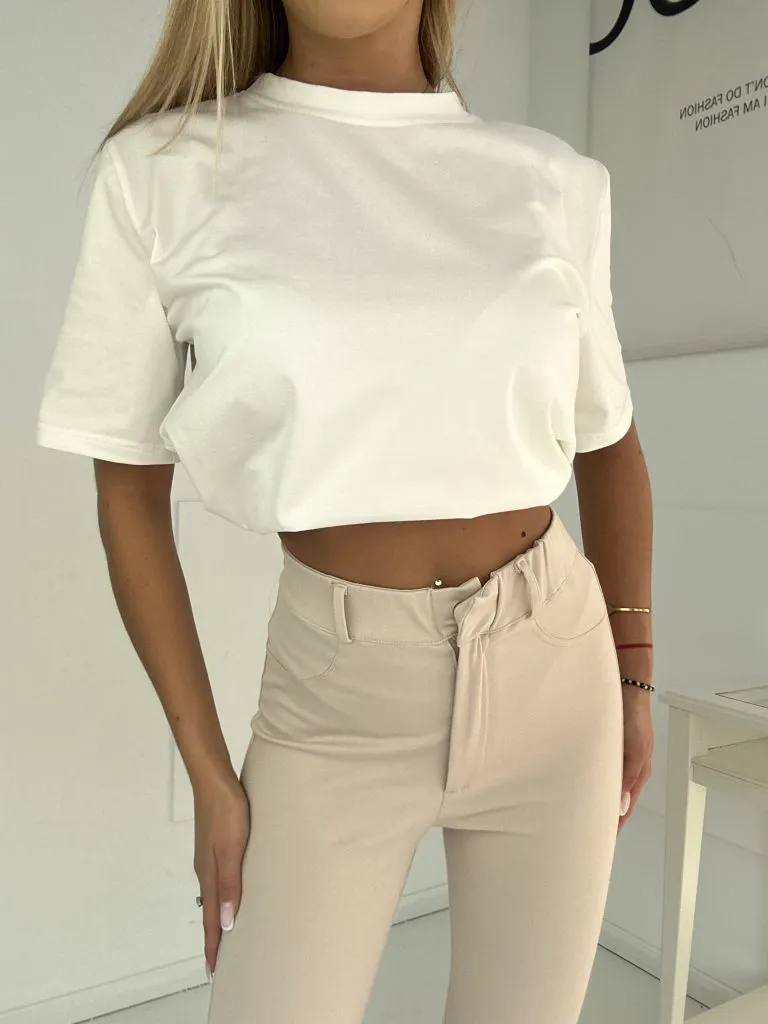 Dámske legíny so zapínaním na zips a krytým patentným gombíkom.