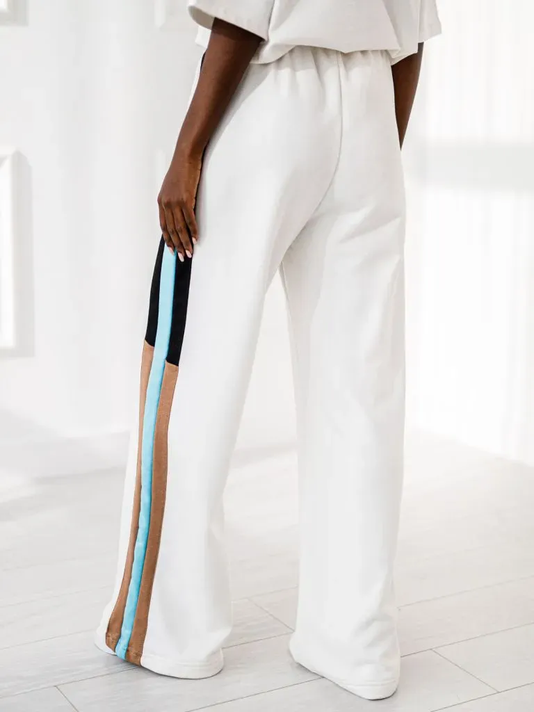 Wholesale - Sweatpants with a colored stripe - Ecru